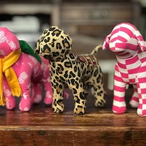 3 VS Pink dogs. Stand approximately 5-6” and are about 7-8” long.